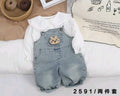 Girls denim dungaree set featuring a white long-sleeve blouse with a ruffled collar