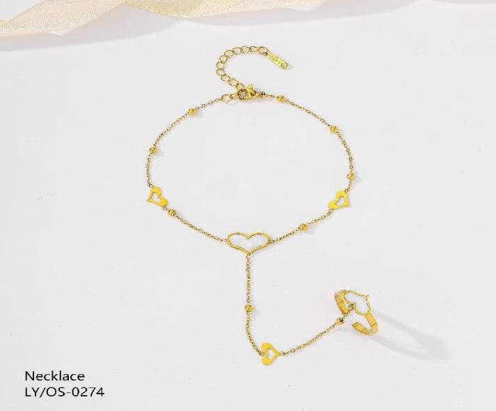 Gold bracelet with heart-shaped links on a white background
