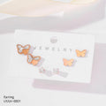 Butterfly-shaped earrings on a jewelry card with 'LY/LH-0001' label.
